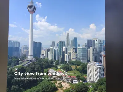 a view of a city with the seattle needle at Ceylonz Suites, Bukit Bintang, Kuala Lumpur in Kuala Lumpur