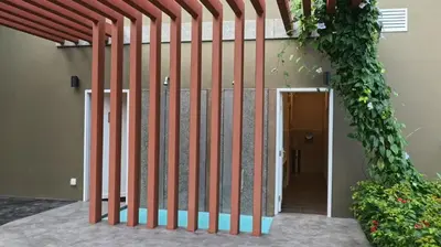 a wooden fence in front of a building at Luxury Suites Majestic Residences at Heart of KLCC in Kuala Lumpur
