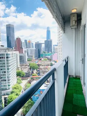 a balcony with a view of a city at Sweet cozy house by seri bukit Ceylon in Kuala Lumpur