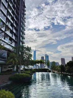 a river in the middle of a city with buildings at KL City Central TRX 3 Bedrooms 2 Baths & Balcony in Kuala Lumpur