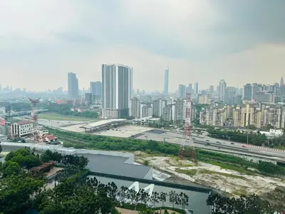 a view of a city with buildings and a freeway at MVA19#Family Suite 8 pax 3 Rooms Sunway Velocity Mall, MRT Maluri Cheras in Kuala Lumpur
