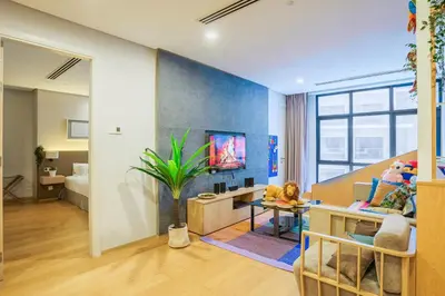 a childrens room with a blue wall at 188 Suites by KidsCastle in Kuala Lumpur