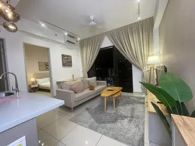 a living room with a couch and a table at Comfy 1BR klcc view imperial suite B47 09 Trion KL in Kuala Lumpur