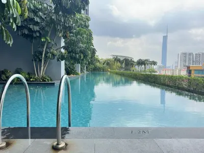 a swimming pool in the middle of a building at Couple home Netflix free parking A45 08St Trion KL in Kuala Lumpur