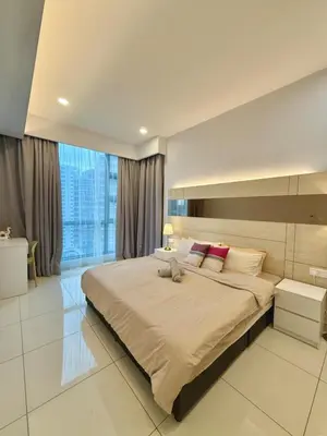 a large bed in a bedroom with a large window at Robertson Homefeel 1R1B at Bukit Bintang KL KLCC in Kuala Lumpur