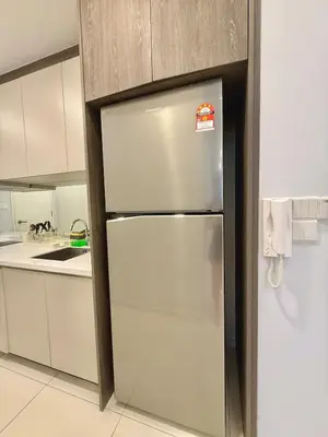 a stainless steel refrigerator in a kitchen at Robertson Homefeel 1R1B at Bukit Bintang KL KLCC in Kuala Lumpur