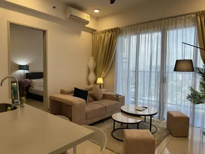a living room with a couch and a table at Couple 1BR suite B33 03 free parking Netflix Trion KL in Kuala Lumpur