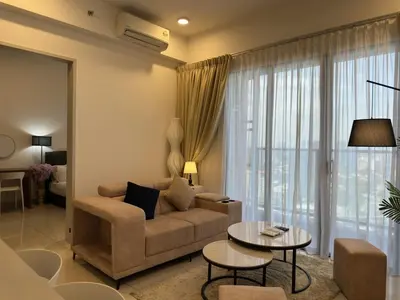 a living room with a couch and a table at Couple 1BR suite B33 03 free parking Netflix Trion KL in Kuala Lumpur