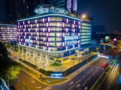 a building with a lit up sign on it at night at Couple nest A37 10St Trion KL in Kuala Lumpur