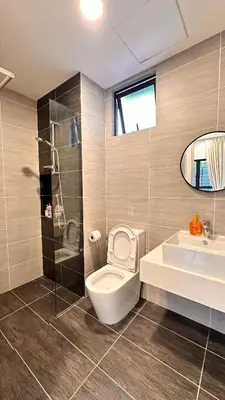 a bathroom with a toilet and a sink and a shower at Couple nest A37 10St Trion KL in Kuala Lumpur