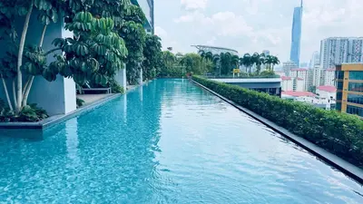 a swimming pool in the middle of a city at Couple studio A21 09 Netflix Trion KL in Kuala Lumpur