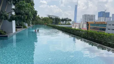 a swimming pool in the middle of a city at Couple Studio Suite A28 07 Trion KL in Kuala Lumpur