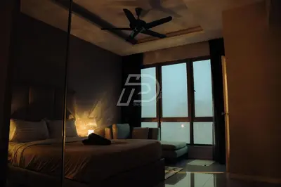 a bedroom with a bed and a ceiling fan at Dorsett Hartamas KL, Bathtub Smart TV & WiFi in Kuala Lumpur