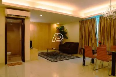 a living room with a couch and a table at KL Hartamas 1BR, Mall Link, Wifi Smart TV in Kuala Lumpur