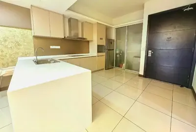 a kitchen with a sink and a counter top at Suasana Suites by Lisa in Kuala Lumpur