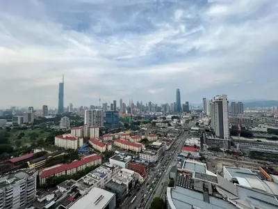a view of a city with many tall buildings at Trion KL By AlwaysHome in Kuala Lumpur