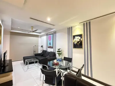 a living room with a table and a couch at 0710 Sweet Home-Casa Residency 2R 2B in Kuala Lumpur