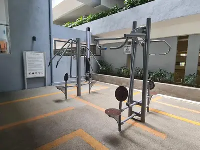 a row of gym equipment in a building at Compact Studio Near Gleneagles KLCC in Kuala Lumpur