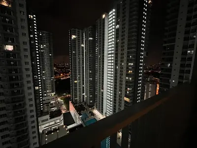 a view of a city at night with tall buildings at Raay Home at Razak City Residence KL in Kuala Lumpur