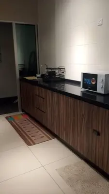 a kitchen with a counter with a microwave on it at Raay Home at Razak City Residence KL in Kuala Lumpur