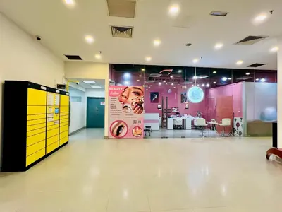 a large room with pink and yellow walls at Luxury Mercu Summer Suites KLCC By Majestic in Kuala Lumpur