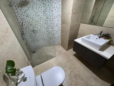 a bathroom with a sink and a toilet and a mirror at Regalia KLCC Pavilion Ceylon Jalan Alor 8 PAX 2R2B in Kuala Lumpur