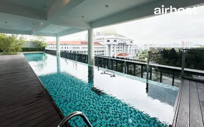 a swimming pool on the roof of a building at MET 1 Residences Mont Kiara by Airhost in Kuala Lumpur