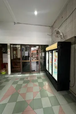 a lobby of a store with a tile floor at 98 Inn BilikXpert at Chow Kit in Kuala Lumpur