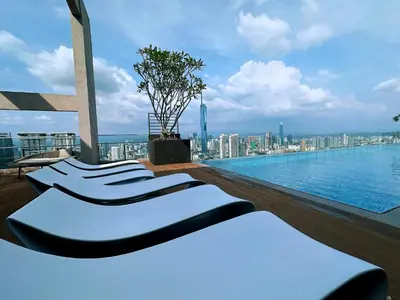 a pool on the roof of a building with a city at KL Sentral Monorail 4 pax Kuala Lumpur, Sky Pool Family Merdeka 118 Nice View in Kuala Lumpur