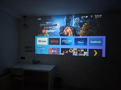 a wall with a large screen with games on it at VG Homes in Kuala Lumpur