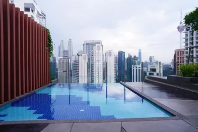 a swimming pool on top of a city skyline at KLCC View Serviced Apartment at Majestic Residence Kuala Lumpur in Kuala Lumpur