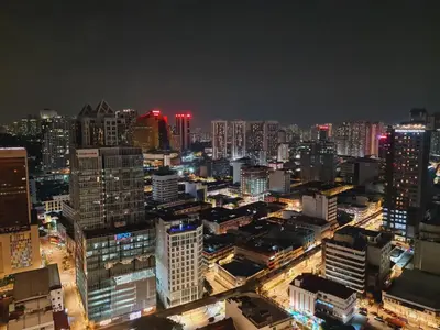 a view of a city at night at KLCC View City Center At Majestic residence in Kuala Lumpur