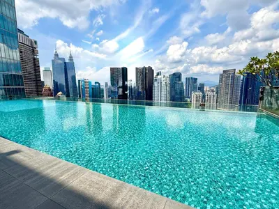 a large swimming pool on top of a city skyline at Dorsett Serviced Suites Kuala Lumpur By NP in Kuala Lumpur