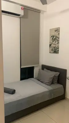 a bed in a white room with a window at Cozy Stay at Legasi 5 min Walking distance to KLCC 2 in Kuala Lumpur