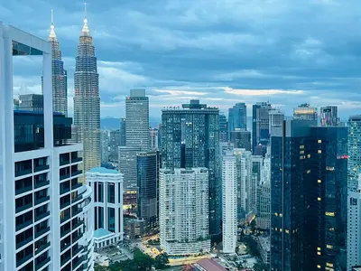 a view of a large city with tall buildings at The Platinum KLCC By Elegant Suites in Kuala Lumpur