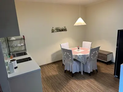 a kitchen with a table and chairs in a room at Setapak Central Mall 2 Bed Zetapark Home Sweet Home in Kuala Lumpur