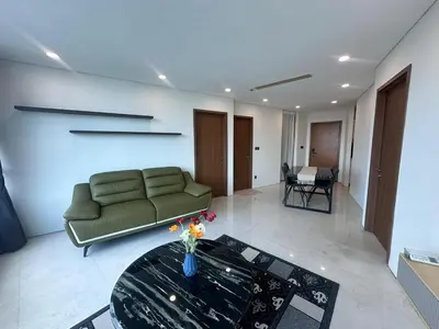 a living room with a couch and a table at Newly Renovated 3 Bedroom Vortex Suites KLCC by Tharwa in Kuala Lumpur
