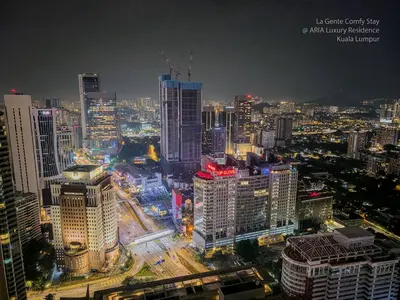 a view of a city at night with buildings at Luxe Spacious 2BR Condo KLCC 600mbps Full Furnish in Kuala Lumpur