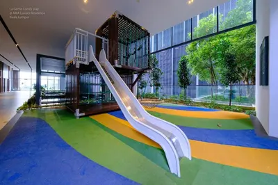 a playground with a slide in a building at 2R2B KLCC ARIA Hi Luxury Amazing Facilities ZEN in Kuala Lumpur
