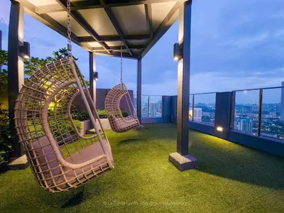 two swings on the balcony of a building at 2R2B Velocity TWO KLCC TRX Sunway Medical LaGente in Kuala Lumpur