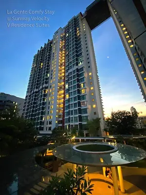 a view of a large apartment building at night at La Gente Comfy Stay 2R2B Velocity - KL City View in Kuala Lumpur