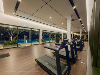 a gym with treadmills and ellipticals in a building at 4R3B Luxe KLCC Embassy Pavilion 600MBPS Gas cook in Kuala Lumpur