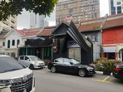 a black car parked in front of a building at Anggun Residence by Harmony Home in Kuala Lumpur