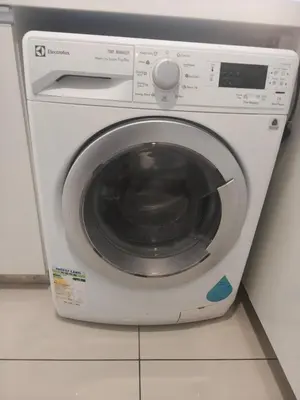 a white washing machine sitting on top of a counter at M city jalan ampang 5mins to klcc water filter walk to shoplot in Kuala Lumpur