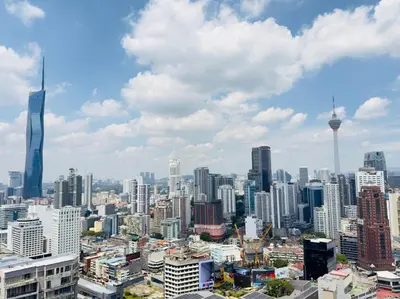 a view of a city with a lot of buildings at LUXURY AXON SUITES KLCC PAVILION At BUKIT BINTANG in Kuala Lumpur