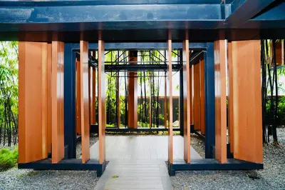 a building with orange and blue columns at Luxury Suites Lucentia Residence KLCC at BBCC in Kuala Lumpur