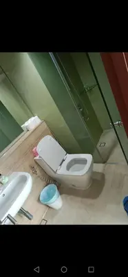 a bathroom with a toilet and a sink at Vortex suites klcc by yana in Kuala Lumpur
