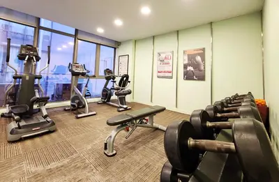 a gym with several treadmills and exercise bikes at Bintang Fairlane Bukit Bintang #121 near Pavilion KLCC Kuala Lumpur in Kuala Lumpur