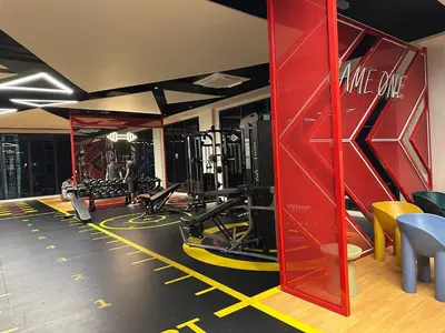 a fitness room with a gym with tread machines at Majestic Residence KLCC By Flixhome in Kuala Lumpur