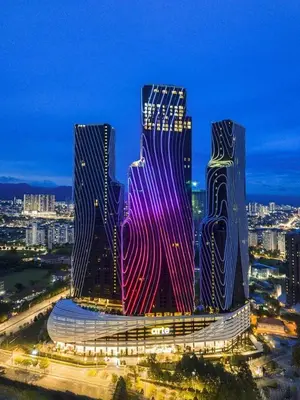 two tall buildings in a city at night at up tp 9pax with Slide, Rock Climbing, Arcade, near City & MITEC in Kuala Lumpur